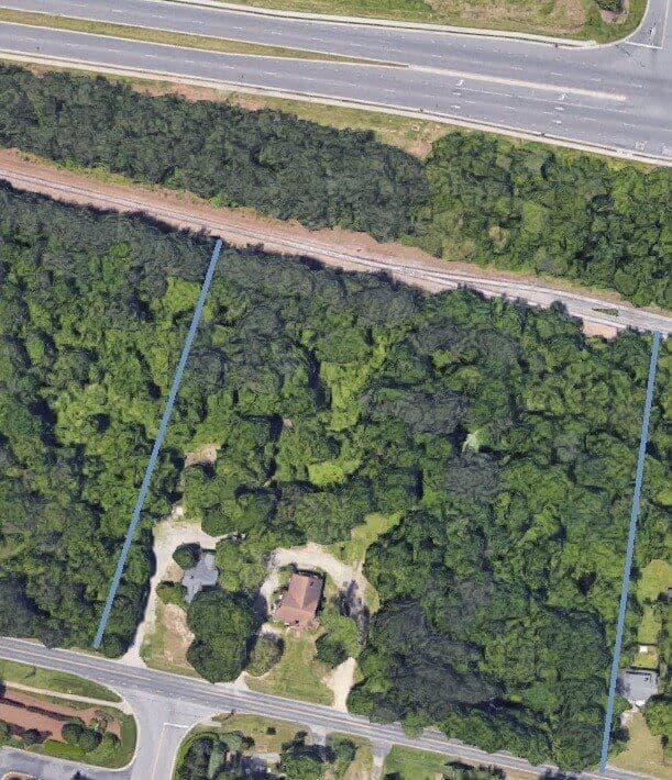 Front view of Masjid property. Property boundary is between the blue lines